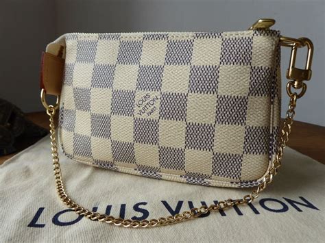 louis vuitton azur mini pochette|Louis Vuitton football player.